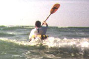 Anclote;Kayaker;Playing in the waves.